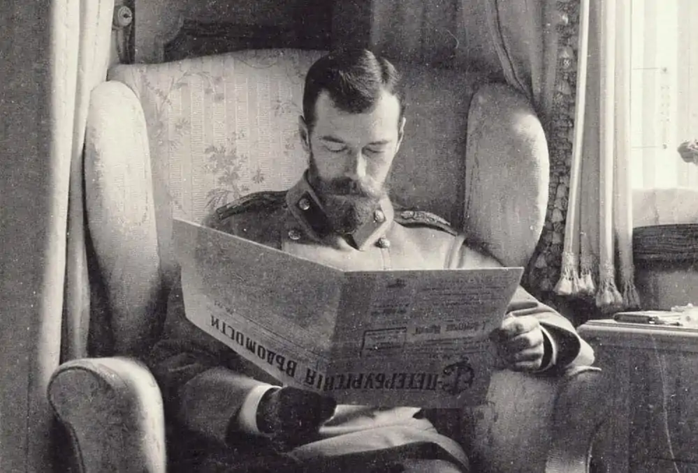 Photograph of Tsar Nicholas II with a newspaper taken before 1917