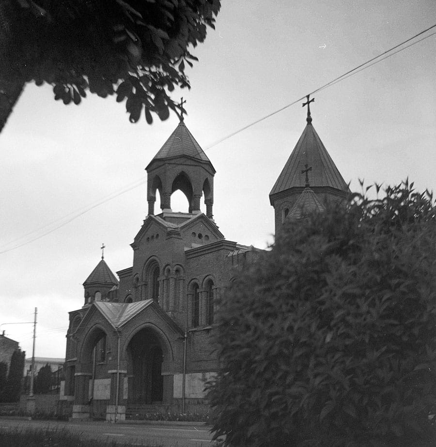 Lubitel TLR sample photo showing village church and trees on 120 film