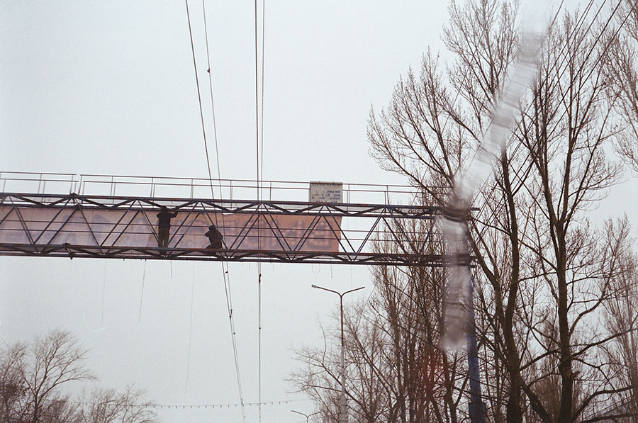 Men at work shot on a soviet film camera