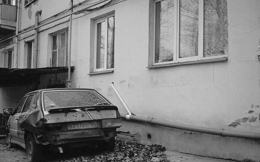 Old car and house taken with a Smena camera and t-22 lens
