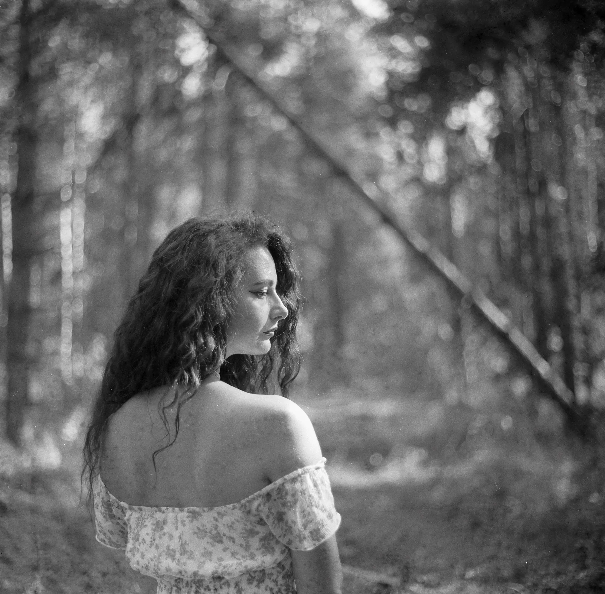 Woman shot on expired svema 250 Soviet film using an iskra camera