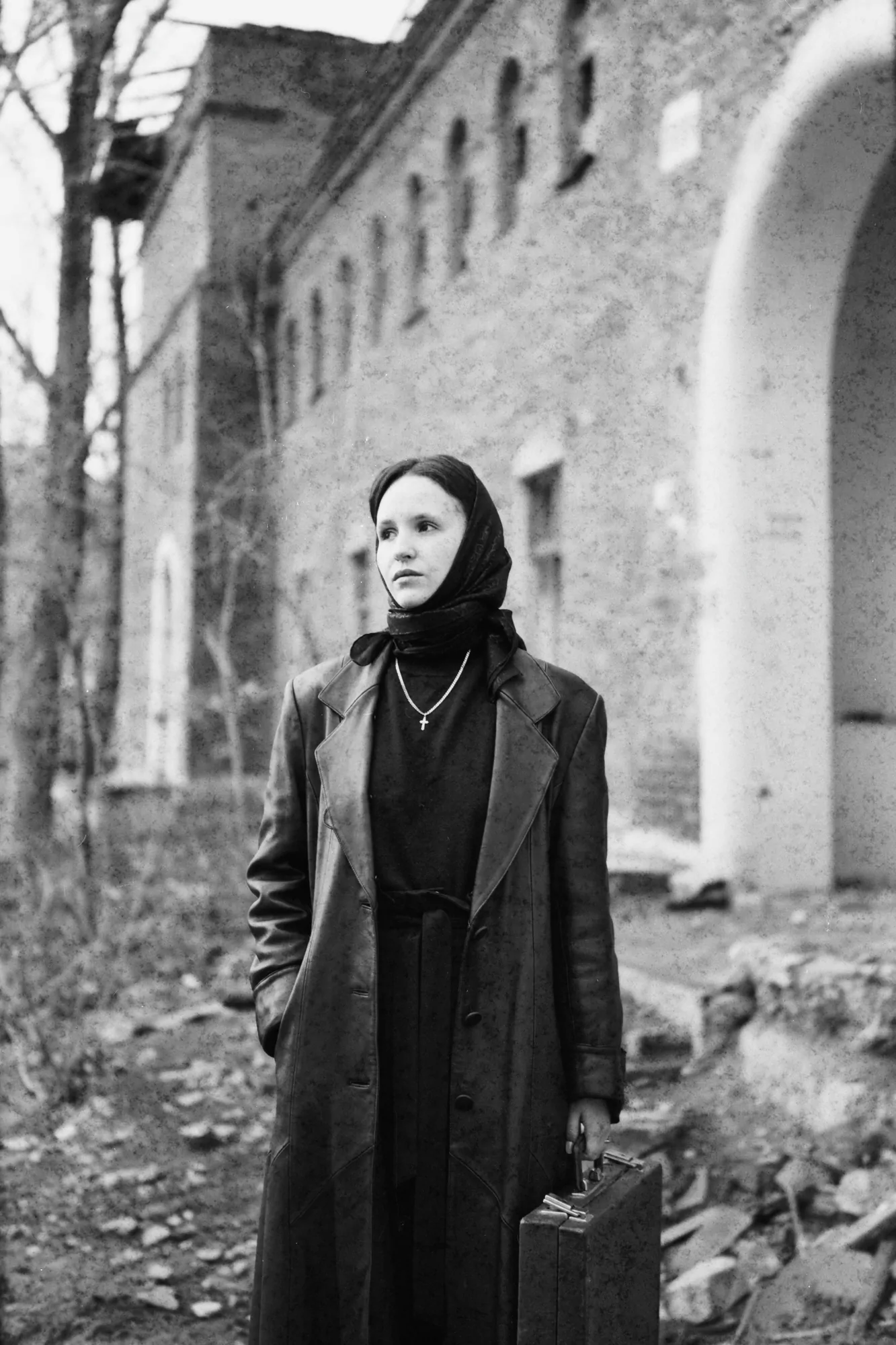 Woman in black shot on expired fomapan film