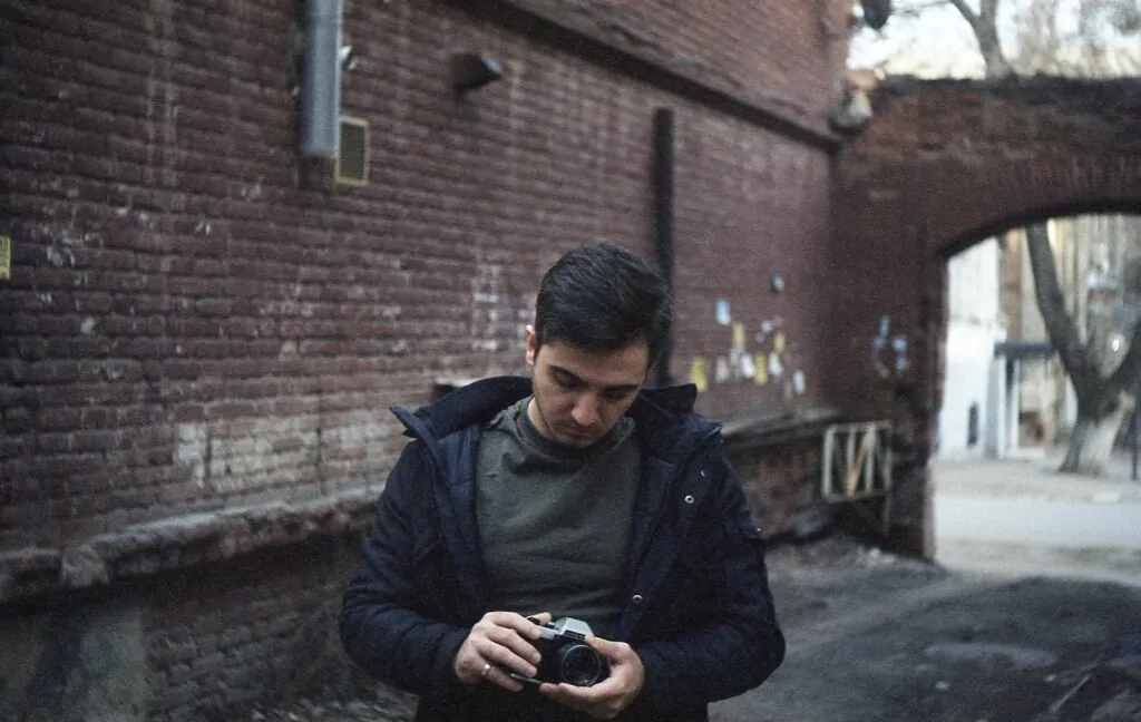 Self portrait with a camera taken on a Soviet lens