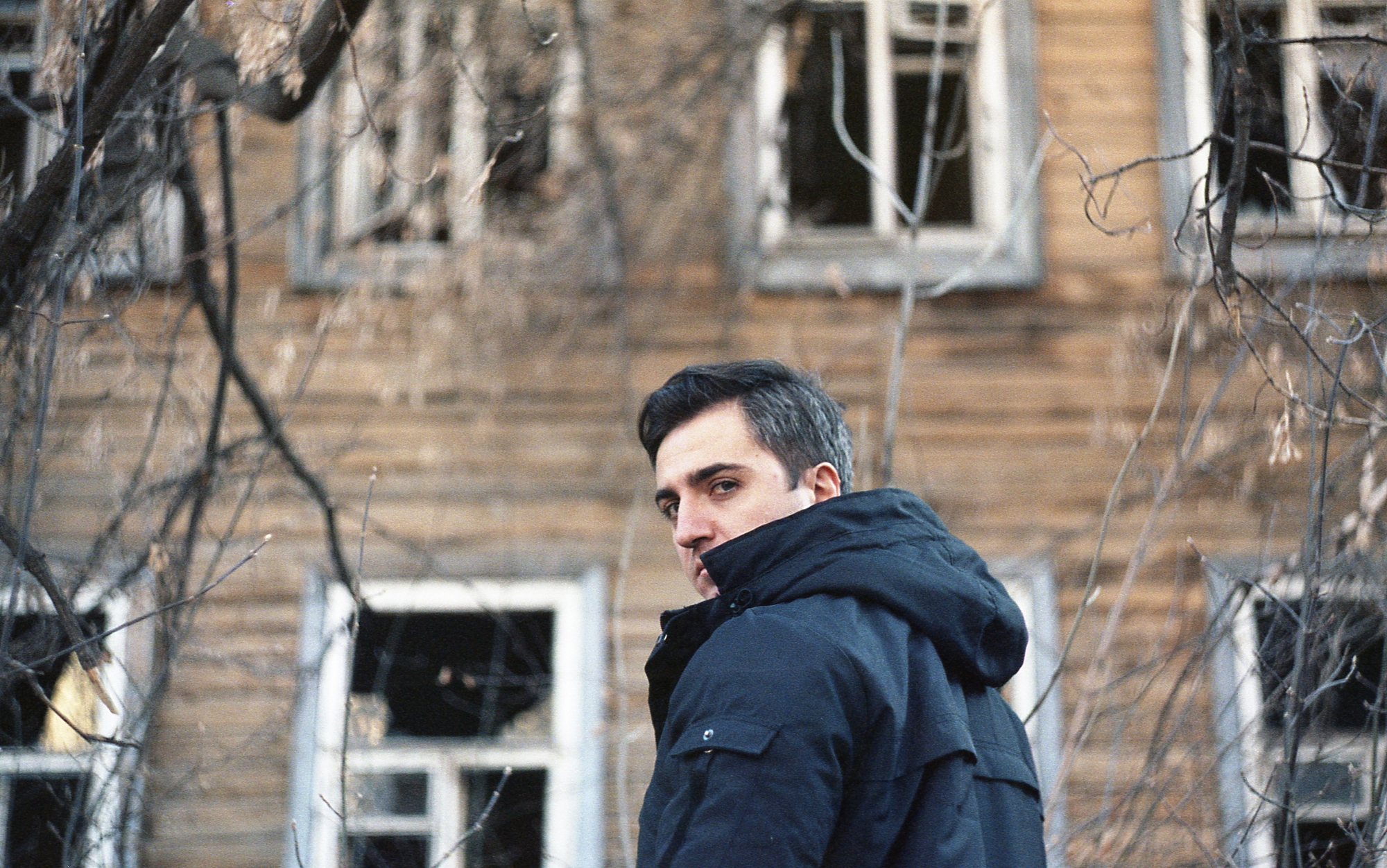 Self portrait against and old house taken on a Woman portrait taken on a Helios 44 f2 58mm