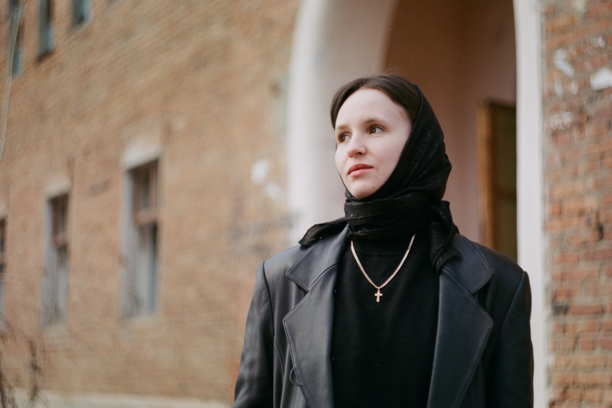 Woman in black shot on a Soviet lens