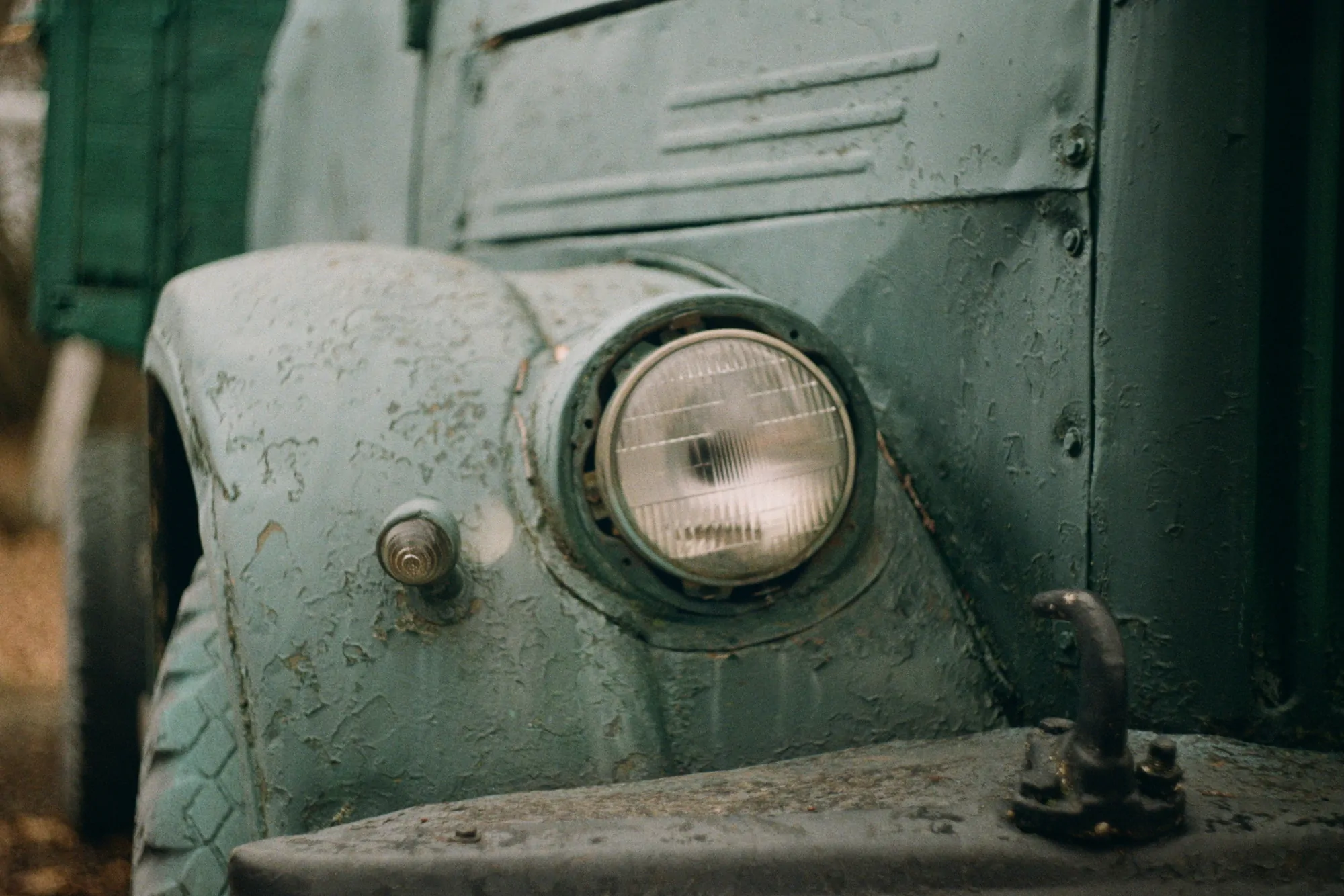 Headlight of an old Soviet car shot on a Helios lens