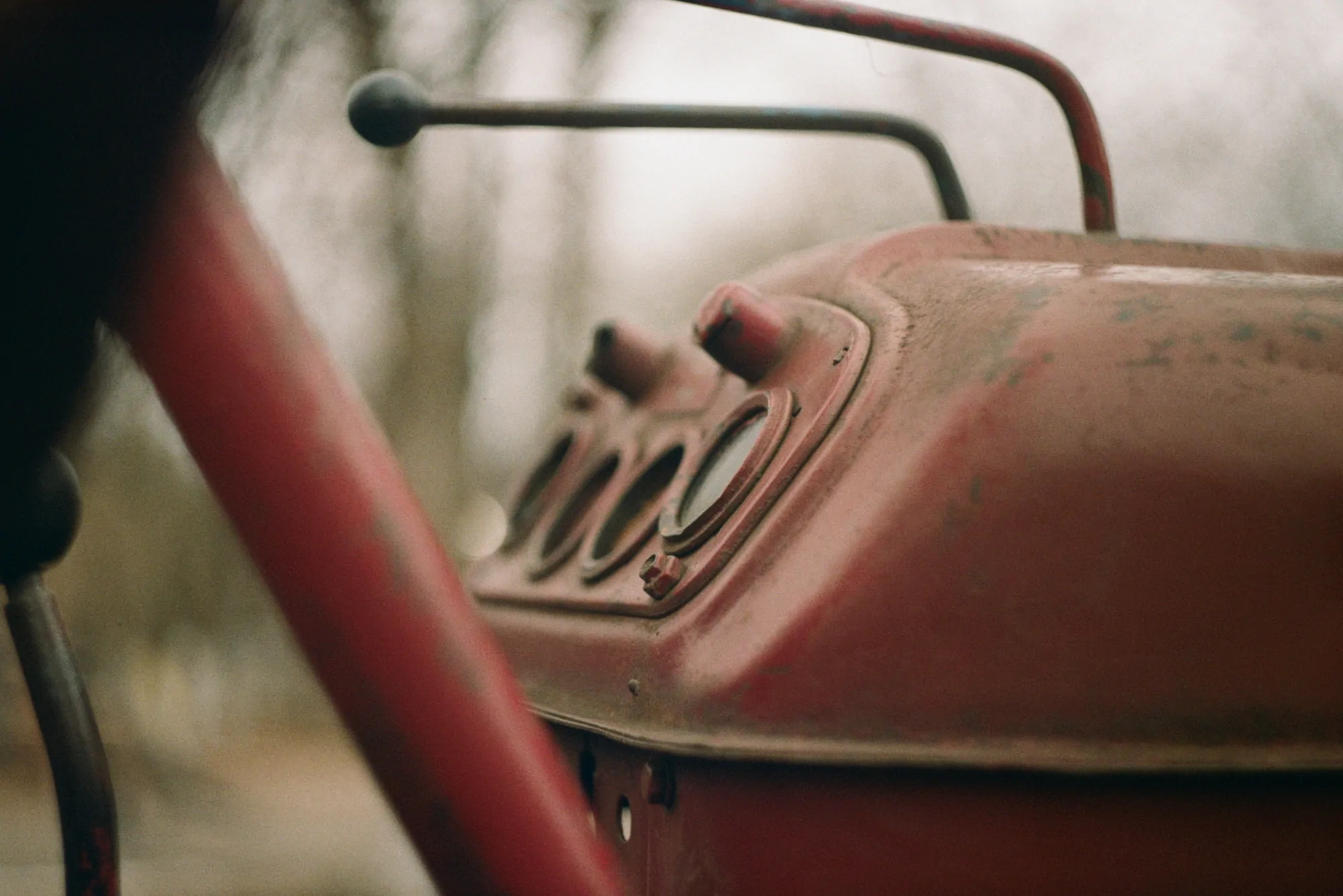 Controls of an old vehicle shot on a Soviet lens