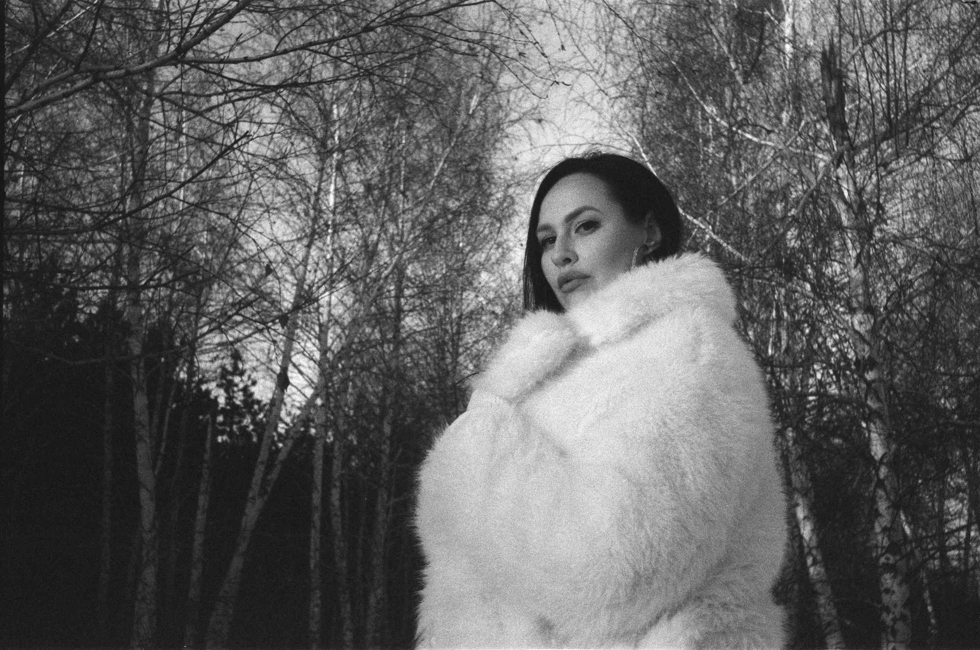 Woman in a fur coat shot on a soviet triplet t-22 lens